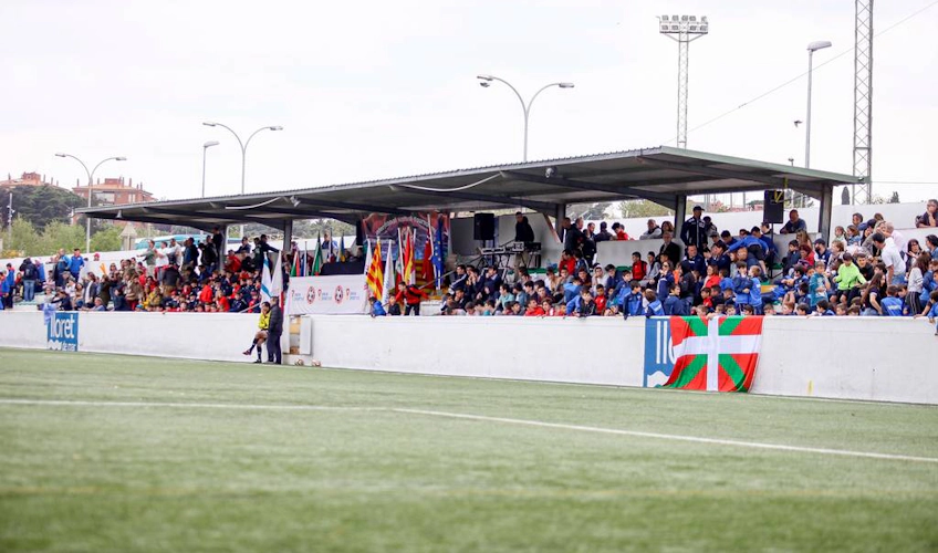 Spectators in the stands at the Trofeo Vila de Lloret football tournament