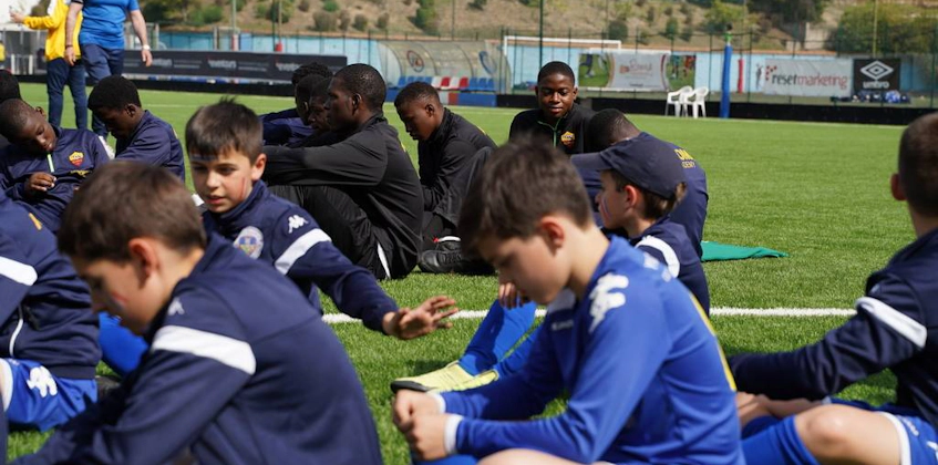 Young soccer players resting at the Trofeo Perla Del Tirreno tournament